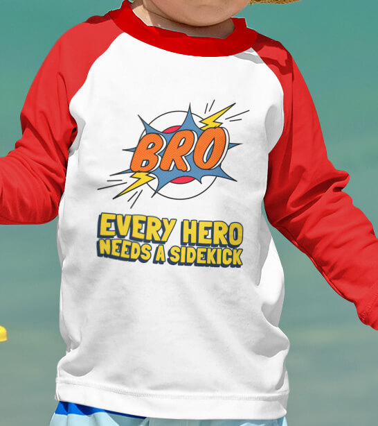 Baby wearing a screen printed long sleeve raglan t-shirt